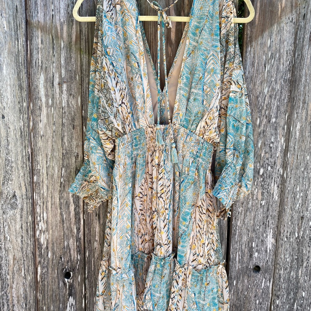 Love stitch mini dress with open back. Cutout sleeves. #bohemian #party dress
